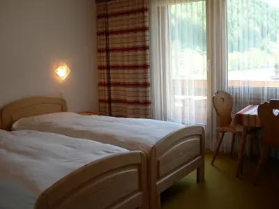 Ein Bett oder Betten in einem Zimmer der Unterkunft Hotel Adler