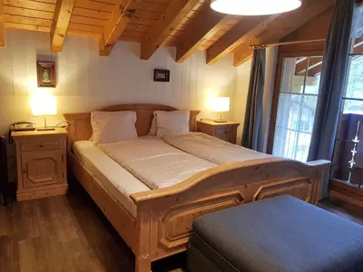 Ein Bett oder Betten in einem Zimmer der Unterkunft Hotel Beau-Séjour