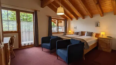 Ein Bett oder Betten in einem Zimmer der Unterkunft Hotel Beau-Séjour