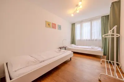 Ein Bett oder Betten in einem Zimmer der Unterkunft Chalet Apartments Iseltwald