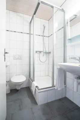 Ein Badezimmer in der Unterkunft Hotel Landhaus Adler