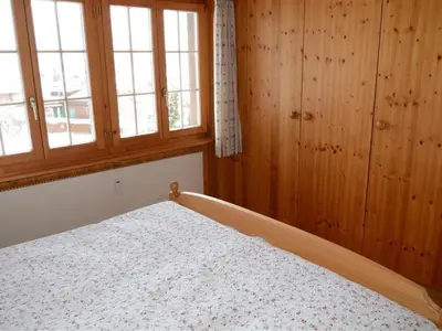 Ein Bett oder Betten in einem Zimmer der Unterkunft Apartment Résidence Sonnegg - Herrli by Interhome