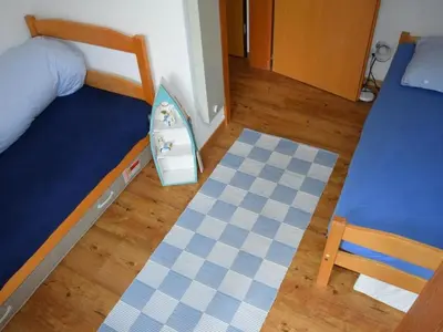 Ein Bett oder Betten in einem Zimmer der Unterkunft Apartment Elena # 1 by Interhome