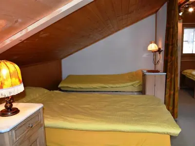 Ein Bett oder Betten in einem Zimmer der Unterkunft Apartment Marmotte- Chalet by Interhome