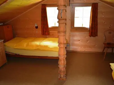 Ein Bett oder Betten in einem Zimmer der Unterkunft Apartment Marmotte- Chalet by Interhome