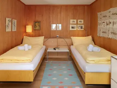 Ein Bett oder Betten in einem Zimmer der Unterkunft Apartment Jungfrau a d Ledi-1 by Interhome