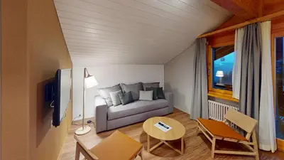 Ein Sitzbereich in der Unterkunft Reka-Feriendorf Hasliberg