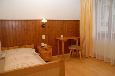 Ein Bett oder Betten in einem Zimmer der Unterkunft Hotel Fiescherhof