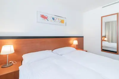 Ein Bett oder Betten in einem Zimmer der Unterkunft Motel Gottardo Sud