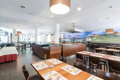 Ein Restaurant oder anderes Speiselokal in der Unterkunft Motel Gottardo Sud