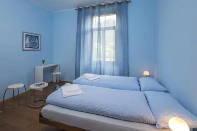 Ein Bett oder Betten in einem Zimmer der Unterkunft Unione