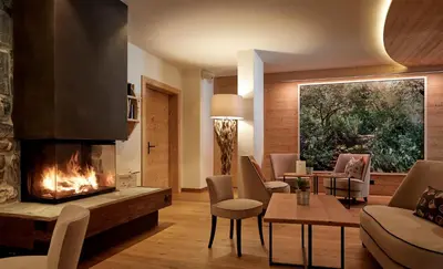 Ein Sitzbereich in der Unterkunft Hotel Alpenland