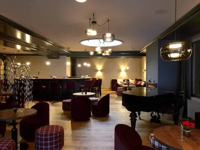 Ein Sitzbereich in der Unterkunft Hotel Simmenhof