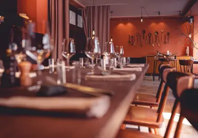 Ein Restaurant oder anderes Speiselokal in der Unterkunft the rex