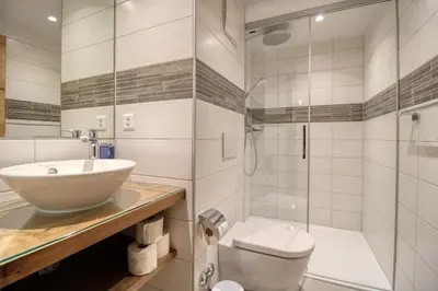 Ein Badezimmer in der Unterkunft Matterhorngruss Apartments