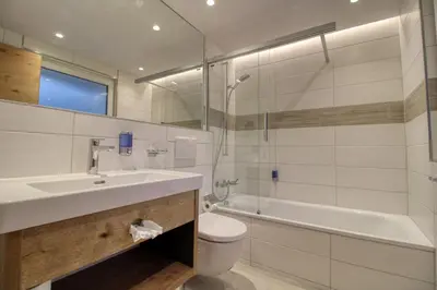Ein Badezimmer in der Unterkunft Matterhorngruss Apartments