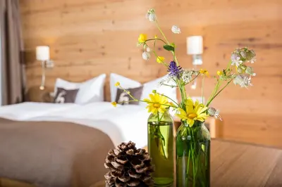 Ein Bett oder Betten in einem Zimmer der Unterkunft Hotel Bettmerhof