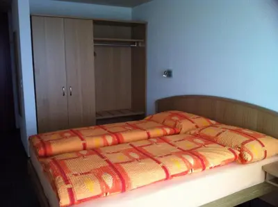Ein Bett oder Betten in einem Zimmer der Unterkunft Chemihütte