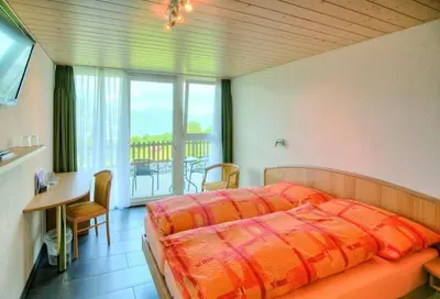 Ein Bett oder Betten in einem Zimmer der Unterkunft Chemihütte