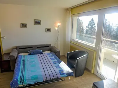 Ein Bett oder Betten in einem Zimmer der Unterkunft Apartment Impéria 10 by Interhome