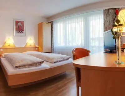 Ein Bett oder Betten in einem Zimmer der Unterkunft Hotel Eden No. 7