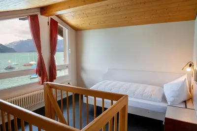 Ein Bett oder Betten in einem Zimmer der Unterkunft Strandhotel Seeblick