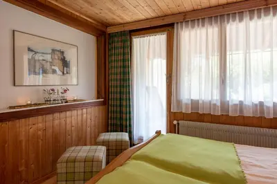 Ein Bett oder Betten in einem Zimmer der Unterkunft Salzano Basic Rooms Interlaken