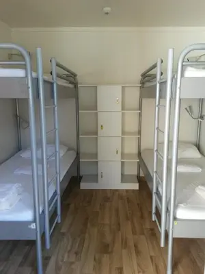 Ein Bett oder Betten in einem Zimmer der Unterkunft RiverLodge TCS Training & Freizeit AG