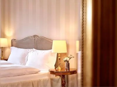 Ein Bett oder Betten in einem Zimmer der Unterkunft Grandhotel Giessbach