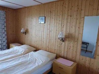 Ein Bett oder Betten in einem Zimmer der Unterkunft Hotel Bellevue