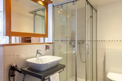 Ein Badezimmer in der Unterkunft Hotel Jägerhof