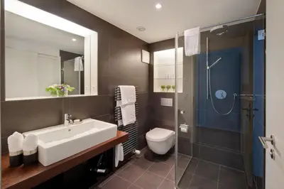 Ein Badezimmer in der Unterkunft Chalet Altesse - Premium Apartments
