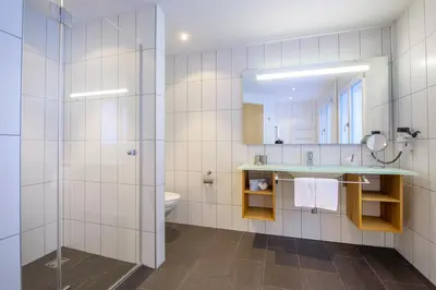 Ein Badezimmer in der Unterkunft Hotel Gädi