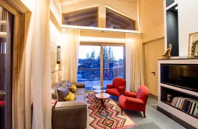 Ein Sitzbereich in der Unterkunft Chalet Migui Luxury Living & Spa *****, Crans Montana