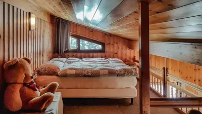 Ein Bett oder Betten in einem Zimmer der Unterkunft Hotel La Cambuse