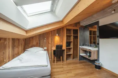 Ein Bett oder Betten in einem Zimmer der Unterkunft Hotel Matterhornblick