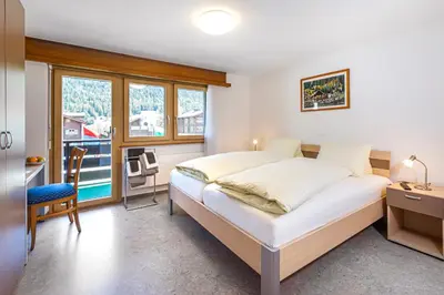 Ein Bett oder Betten in einem Zimmer der Unterkunft Hotel Blinnenhorn