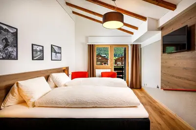 Ein Bett oder Betten in einem Zimmer der Unterkunft Hotel Blinnenhorn