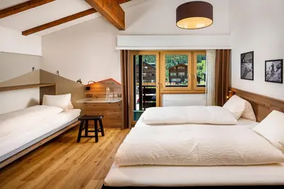 Ein Bett oder Betten in einem Zimmer der Unterkunft Hotel Blinnenhorn