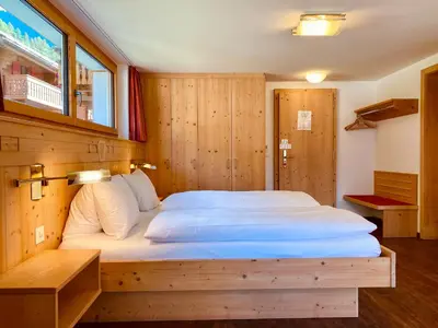 Ein Bett oder Betten in einem Zimmer der Unterkunft Hotel Capricorn