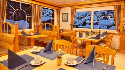 Ein Sitzbereich in der Unterkunft Hotel Capricorn