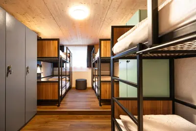 Ein Bett oder Betten in einem Zimmer der Unterkunft Eiger Lodge Easy