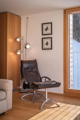 Ein Sitzbereich in der Unterkunft Chalet Roossi 3