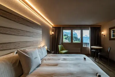 Ein Bett oder Betten in einem Zimmer der Unterkunft Hotel Maya Caprice