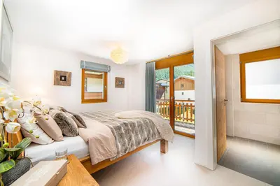 Ein Bett oder Betten in einem Zimmer der Unterkunft Sonnegg Penthouse