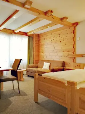 Ein Bett oder Betten in einem Zimmer der Unterkunft Ambiente Mountain Style
