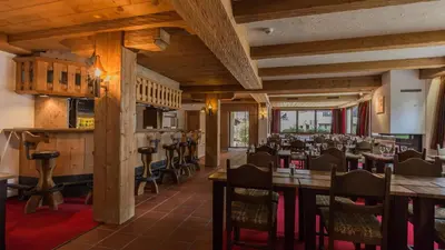 Ein Restaurant oder anderes Speiselokal in der Unterkunft Ambiente Mountain Style