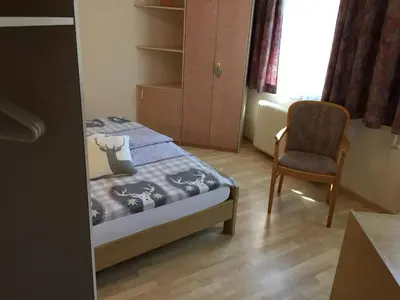 Ein Bett oder Betten in einem Zimmer der Unterkunft Hotel Restaurant Escher