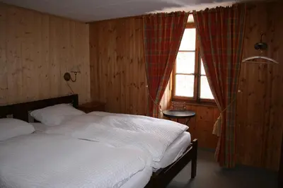 Ein Bett oder Betten in einem Zimmer der Unterkunft Hotel de la Sage