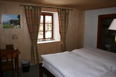 Ein Bett oder Betten in einem Zimmer der Unterkunft Hotel de la Sage
